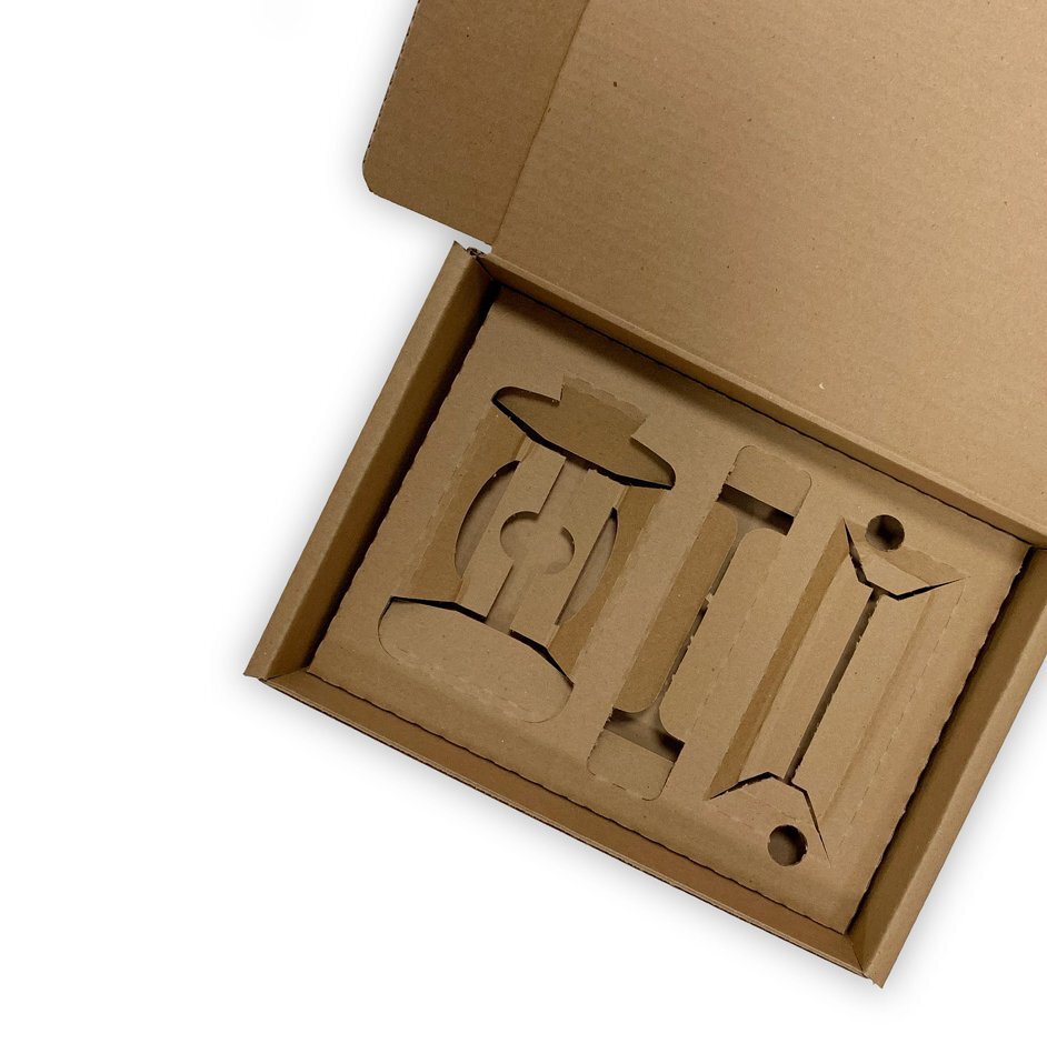 buyboxes-custom-inserts-corrugated-e1617806233647 empty brown mailer box with custom box inserts