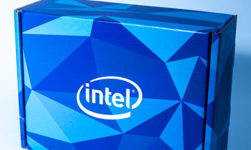 blue mailer box with the text "intel" on it and a geometric shape design